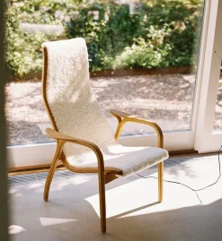 Swedese Armchairs & Footstools*Lamino arm chair laquered beech/sheep skin, Moonlight Beige